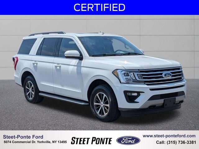 2021 Ford Expedition XLT in Star White Metallic Tri-Coat — front three-quarter view