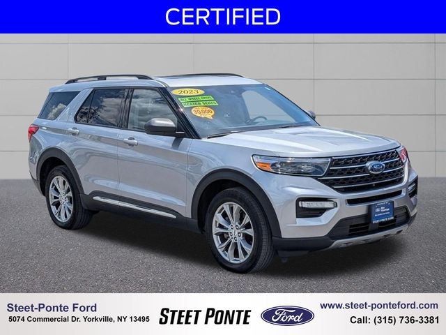 2023 Ford Explorer XLT in Iconic Silver Metallic — front three-quarter view