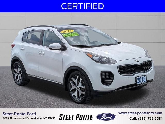 2018 Kia Sportage SX in Snow White Pearl — front three-quarter view